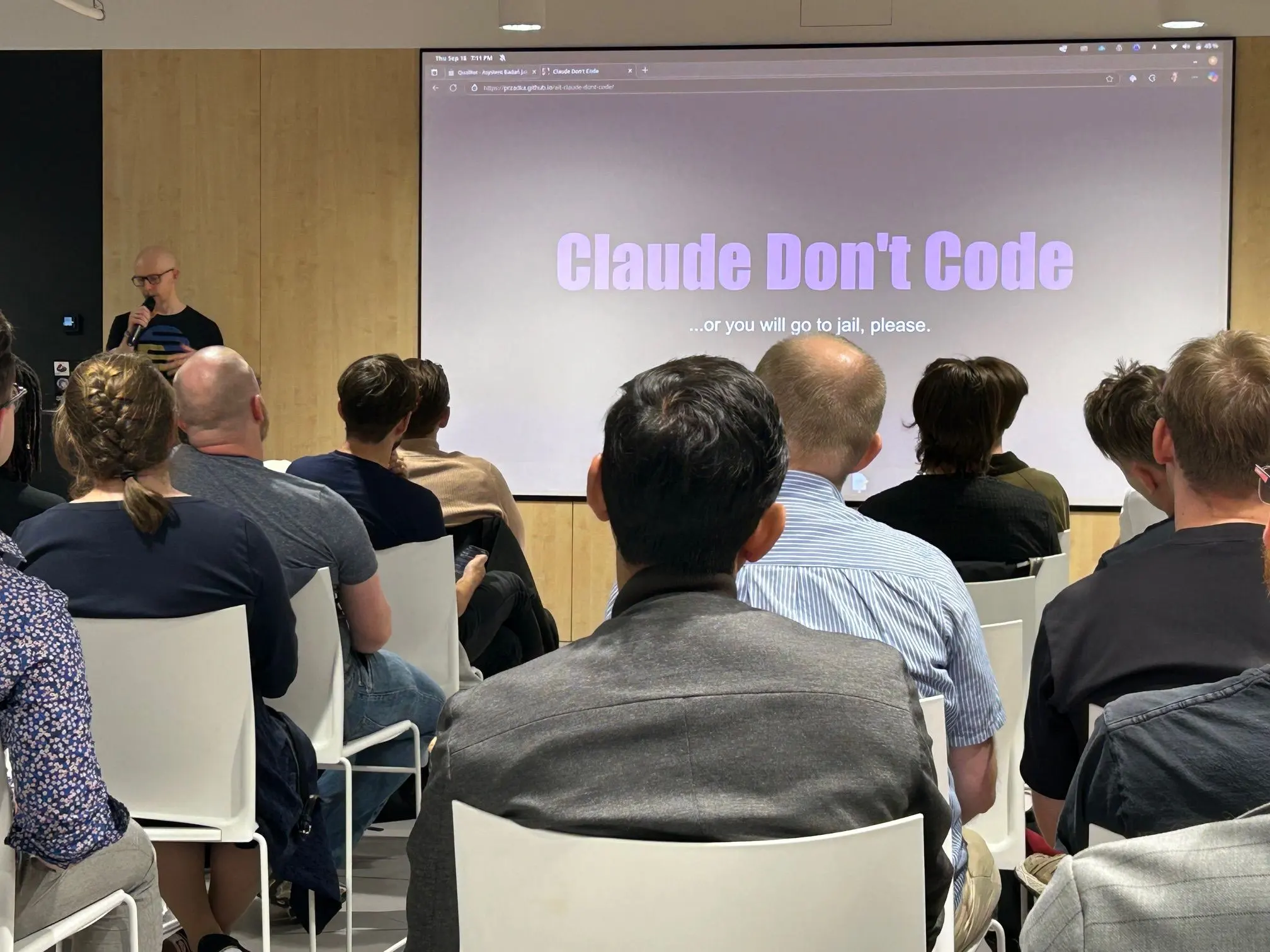 Presenting at AI Tinkerers Warsaw with title slide visible